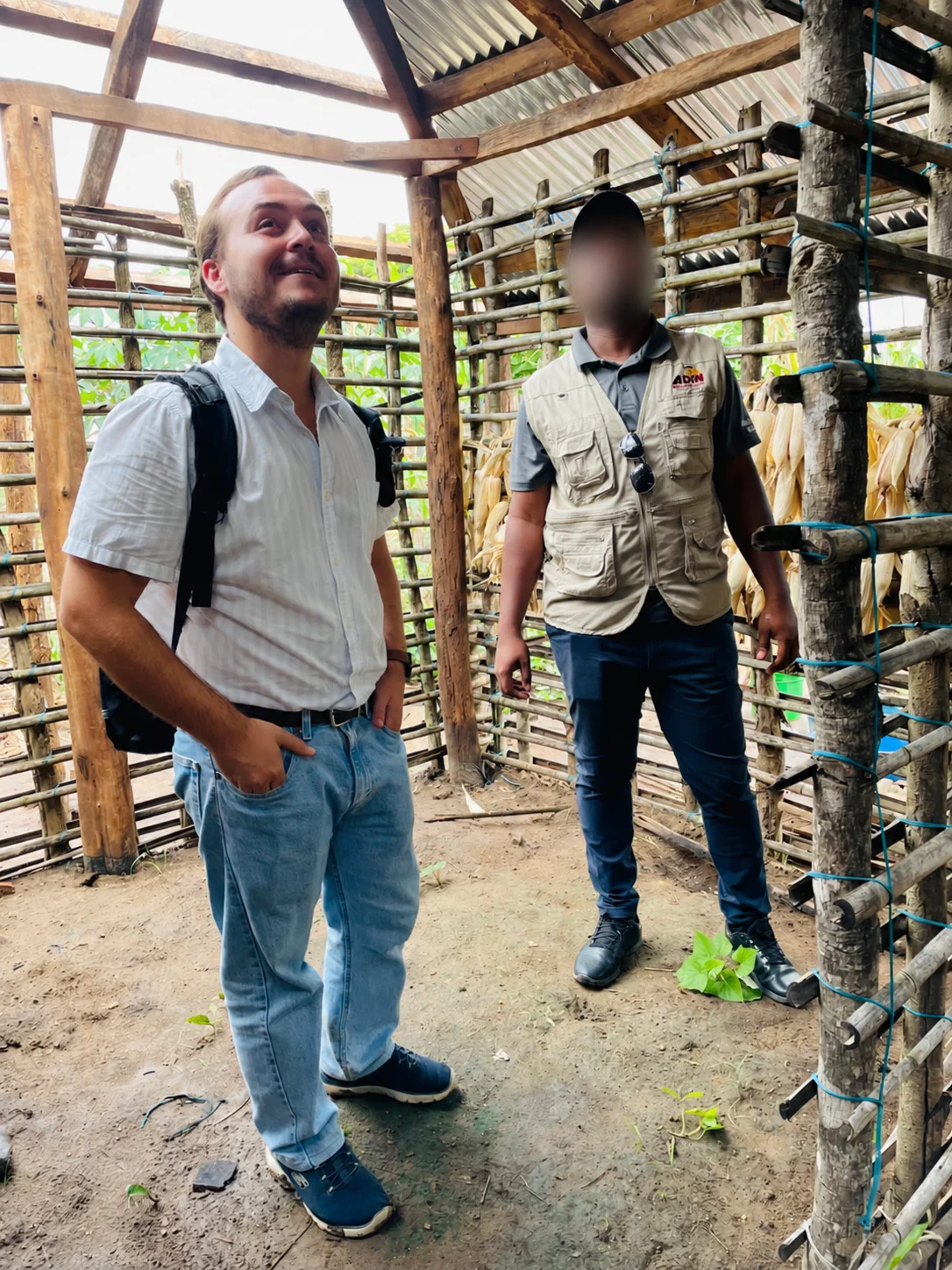 House construction inspection, with a colleague’s face obscured