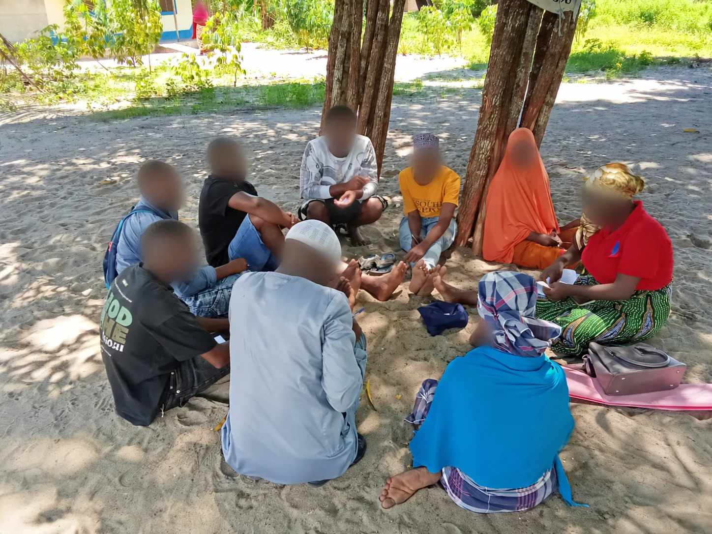 Participants in a group intervention, faces obscured