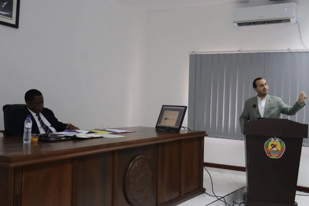 Henrique Pita Barros giving a policy presentation at a lectern